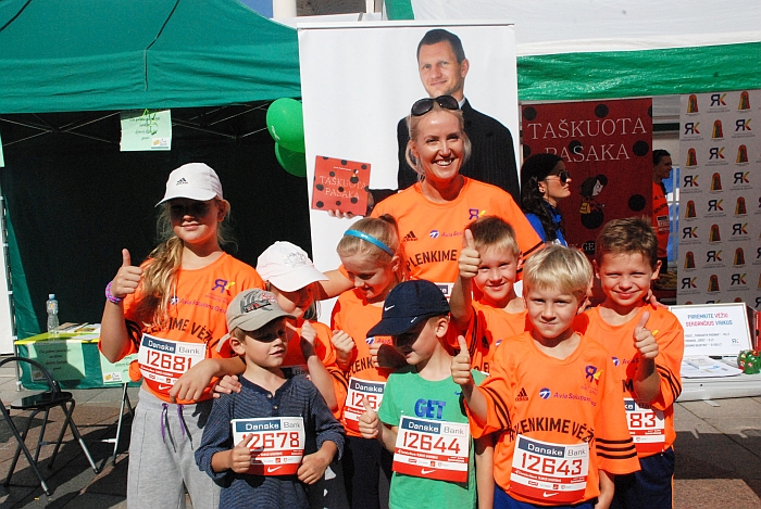 Živilė Pinskuvienė maratone bėgo kartu su pusseserių vaikais.